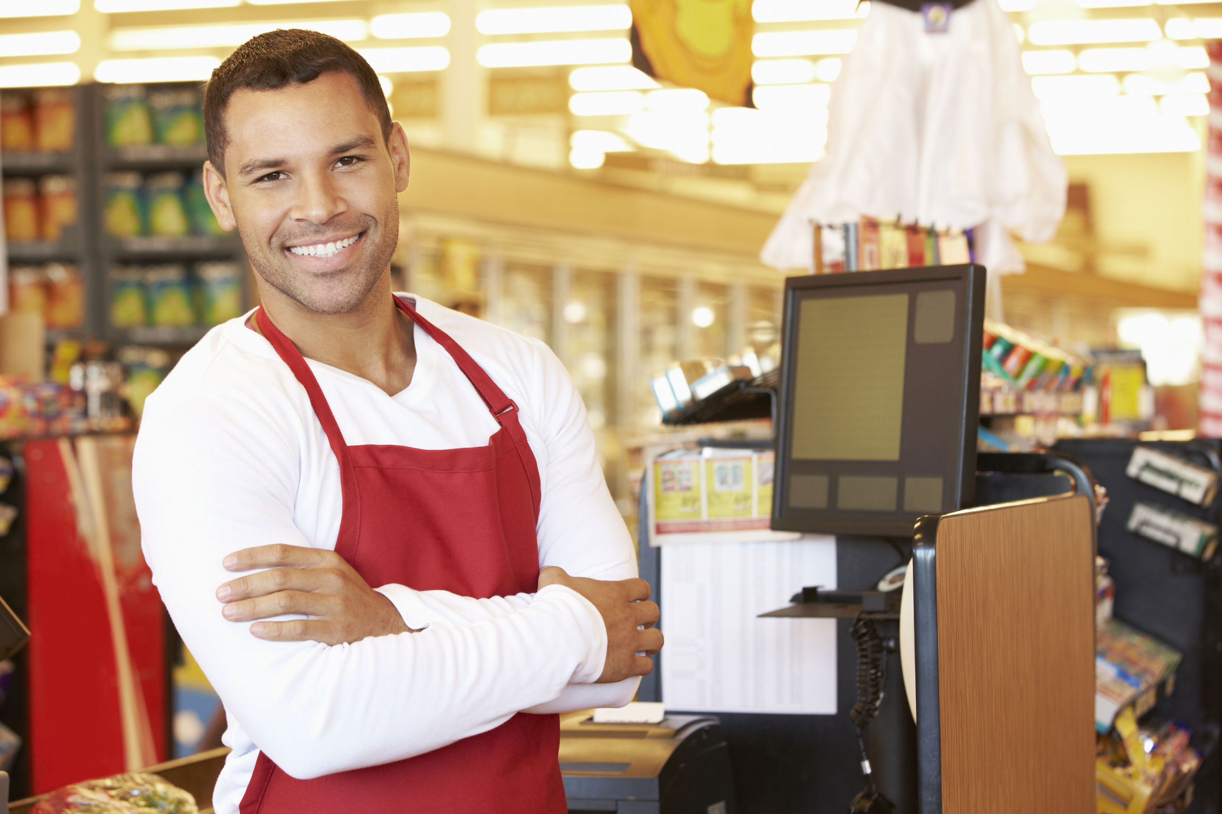 The shop assistant me was. Кассир мужчина. Продавец в магазине мужчина. Парень за кассой. Продавец кассир мужчина.